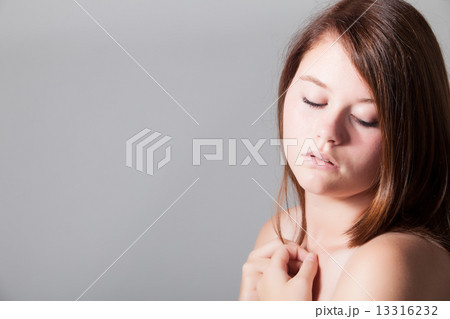 Pretty woman with closed eyes 13316232