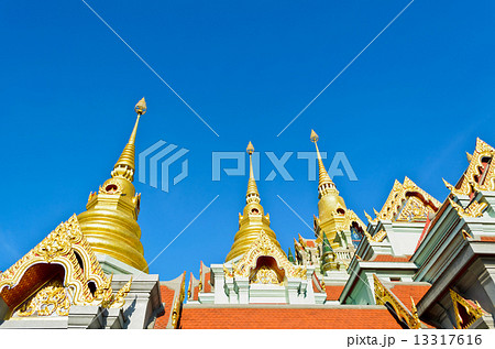 Golden pinnacle of thai temple 13317616