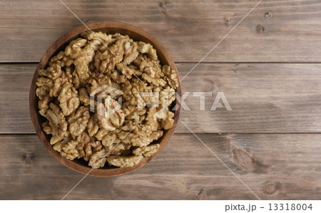 Walnuts in wooden bowl Walnuts in wooden bowl 13318004