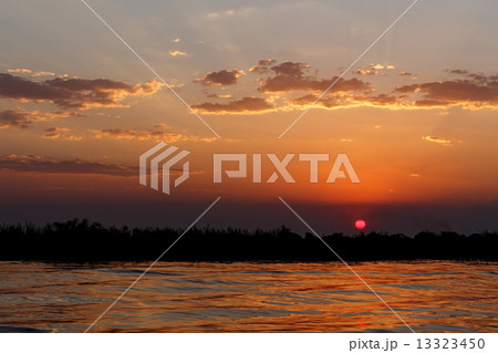 African sunset on Chobe river African sunset on Chobe river 13323450