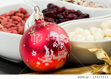 Red christmas bal with chocolate nuts Red christmas bal with chocolate nuts 13323511