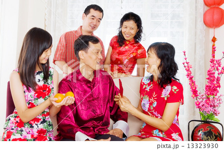 Asian family celebrate Chinese new year Asian family celebrate Chinese new year 13323930