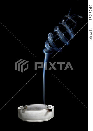 Cigarettes and smoke in ash-tray Cigarettes and smoke in ash-tray 13328260