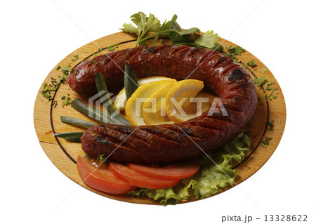 Grilled sausages and lemon 13328622