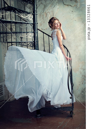 beautiful young girl in a wedding dress beautiful young girl in a wedding dress 13328661