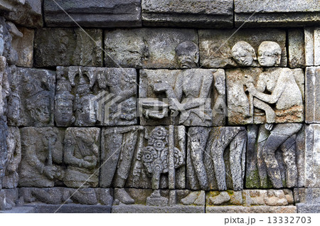 Bass-relief on the wall in Borobudur temple Bass-relief on the wall in Borobudur temple 13332703