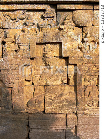Bass-relief on the wall in Borobudur temple 13332713