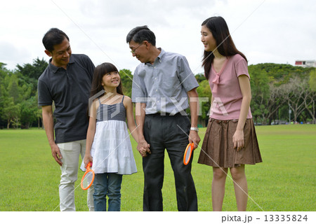 3 generations family day playing at the park 13335824