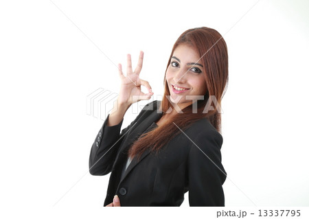 Woman shoiwng ok sign side profile 13337795