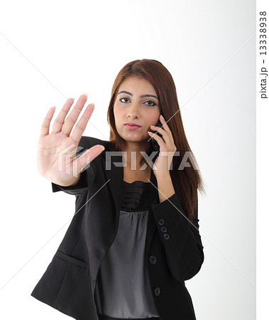 Woman stop sign focus on face Woman stop sign focus on face 13338938