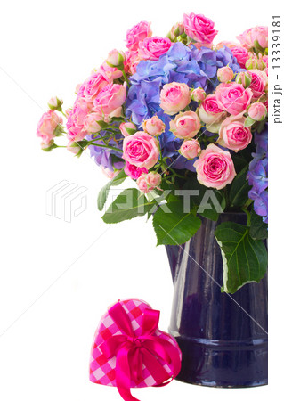 pink roses and blue hortensia flowers close up pink roses and blue hortensia flowers close up 13339181