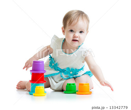 little girl playing with toys isolated little girl playing with toys isolated 13342779