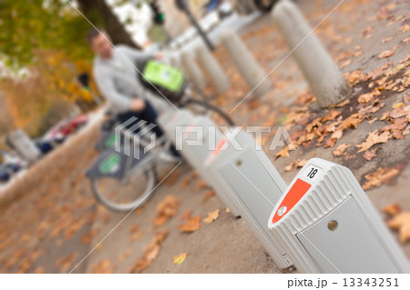 Station of urban bicycles for rent 13343251