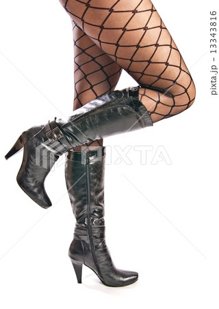 female legs in pantyhose and shoes on high heels 13343816