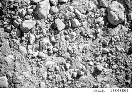 Dry soil and stones of an agricultural field Dry soil and stones of an agricultural field 13343861