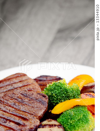 Delicious grilled beef steakes Delicious grilled beef steakes 13344910
