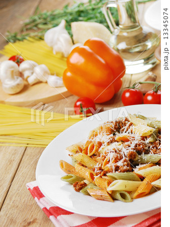 Pasta bolognese on the wooden table 13345074