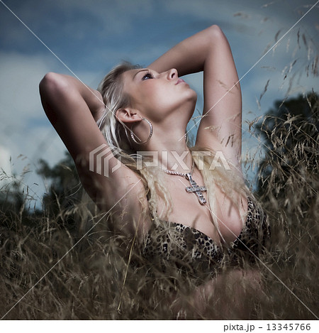 outdoor attractive blond girl in bra 13345766