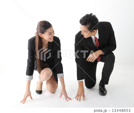 Man woman look at each other at starting to run 13348053