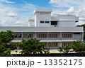 School building with blue sky background 13352175