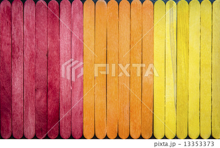 Colorful wooden stripe in three color red orange and yellow  13353373