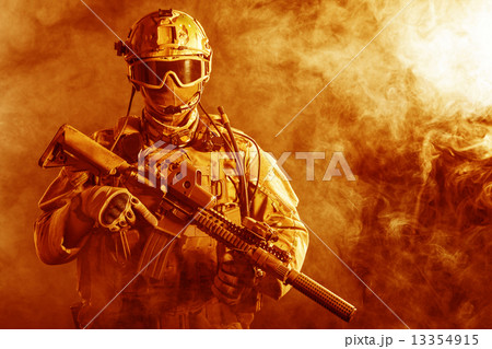 Special forces soldier in the fire 13354915