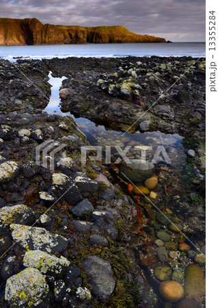 beautiful seascape of creek and rock 13355284