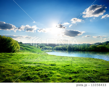 Lawn near river 13356433