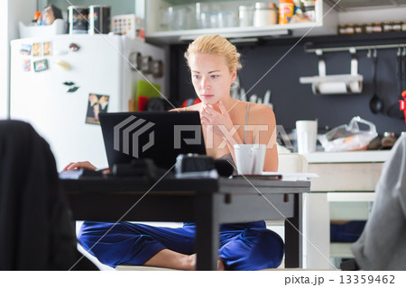 Female freelancer working from home. 13359462