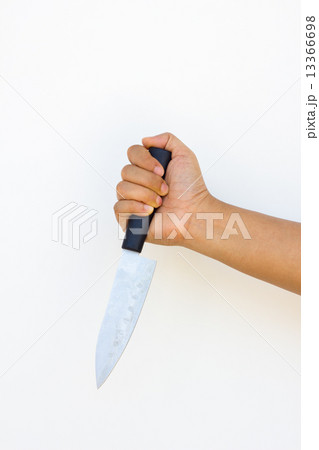 Hand of man hold dirty knife Hand of man hold dirty knife 13366698