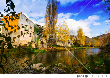 Autumn landscape with river 13370424