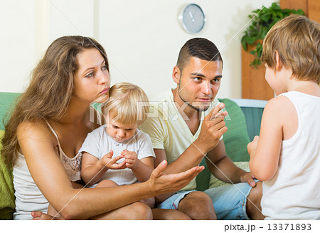 Couple scolding little daughter 13371893