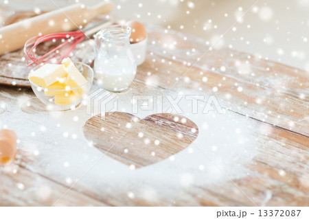 heart of flour on wooden table at home heart of flour on wooden table at home 13372087