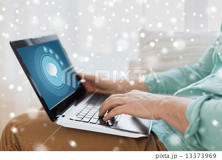 close up of man working with laptop at home 13373969