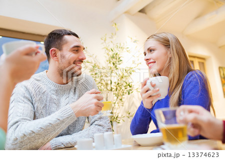 happy couple meeting and drinking tea or coffee happy couple meeting and drinking tea or coffee 13374623