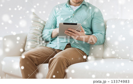 close up of man with tablet pc computer at home close up of man with tablet pc computer at home 13374983