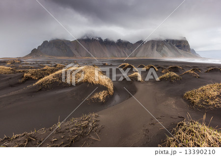 Vesturhorn Mountain and black sand dunes, Iceland Vesturhorn Mountain and black sand dunes, Iceland 13390210