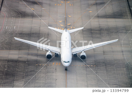 Airplane on a runway. Airplane on a runway. 13394799