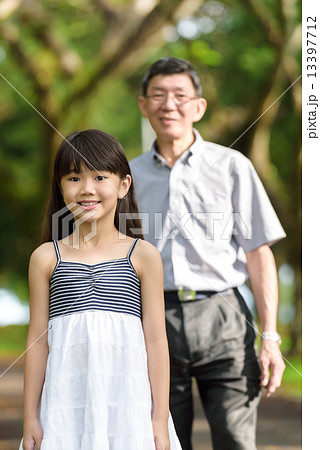 Chinese granddaughter and grandfather in the park Chinese granddaughter and grandfather in the park 13397712