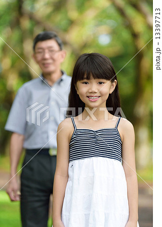 Chinese granddaughter and grandfather in the park Chinese granddaughter and grandfather in the park 13397713