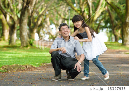 Chinese granddaughter and grandfather in the park Chinese granddaughter and grandfather in the park 13397933
