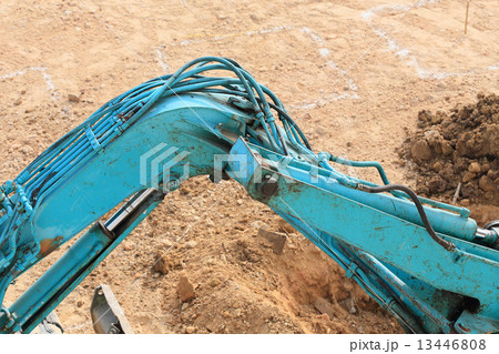 arm of excavator tractor working 13446808