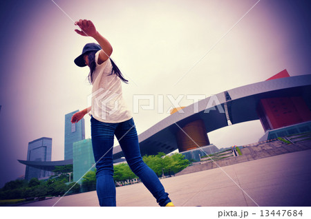 skateboarding woman in the city skateboarding woman in the city 13447684