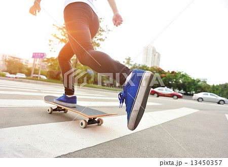 speeding skateboarding woman at city speeding skateboarding woman at city 13450357