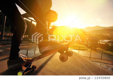 skateboarding woman sunrise  13450800