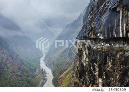 Car on road in Himalayas Car on road in Himalayas 13450809