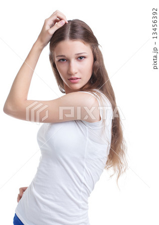 Lovely girl posing at camera, isolated on white 13456392