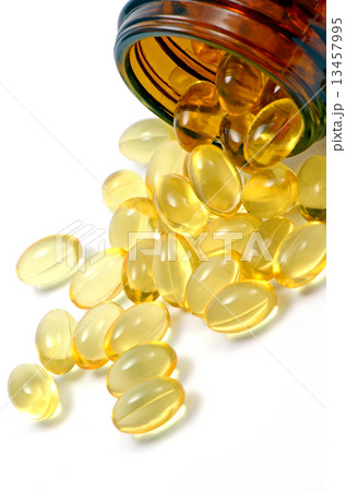 Oval shape of soft gelatin capsule isolated on white background. Oval shape of soft gelatin capsule isolated on white background. 13457995