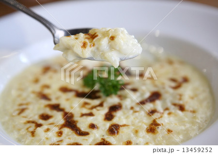 risotto dish with herbs on wood background 13459252