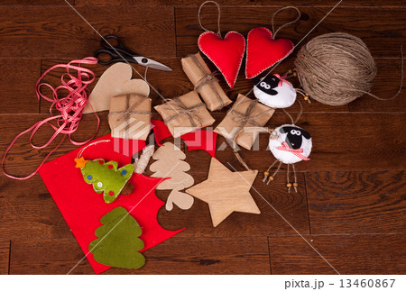 Christmas gift and decor on wooden background Christmas gift and decor on wooden background 13460867